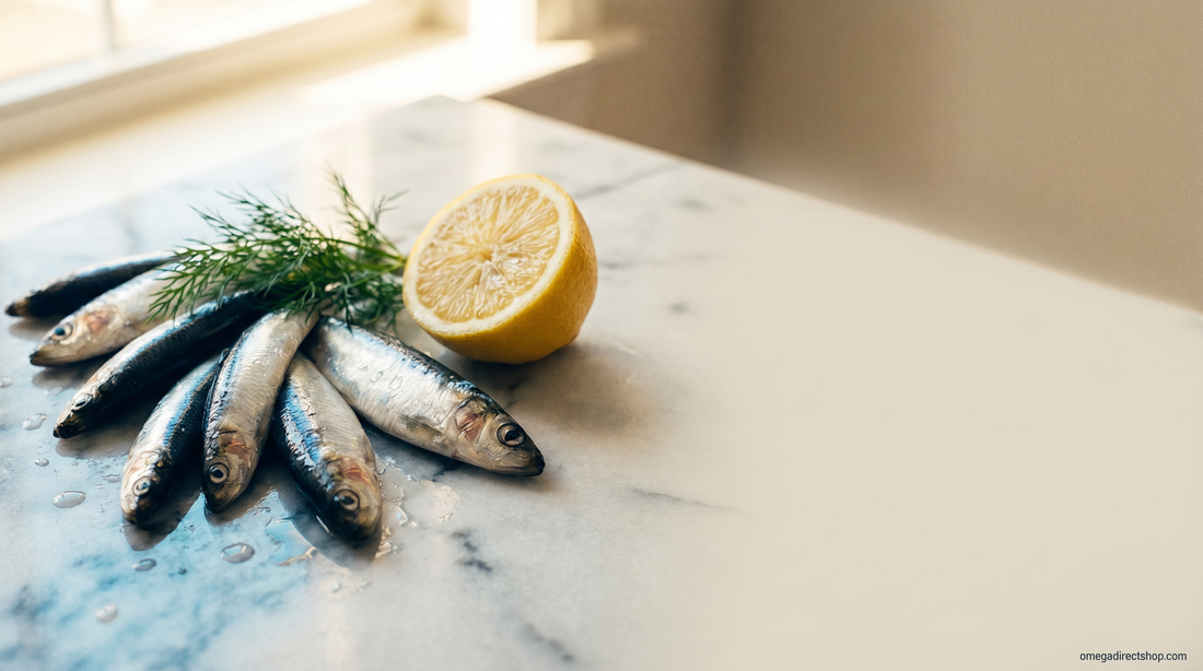 Fresh wild anchovies and sardines on Carrara marble, the small low-mercury fish used for fish oil omega-3